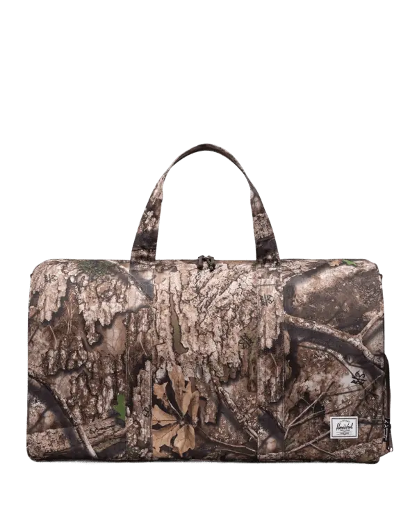 An image of the Realtree® Herschel Novel™ Duffle in APX™ Camo